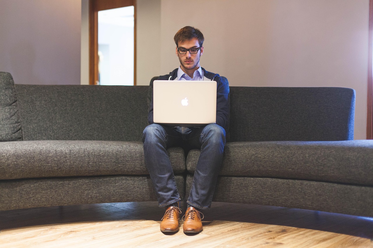 Man, laptop, businessman — Maintaining Quality Control in Custom Rotational Molding Manufacturing