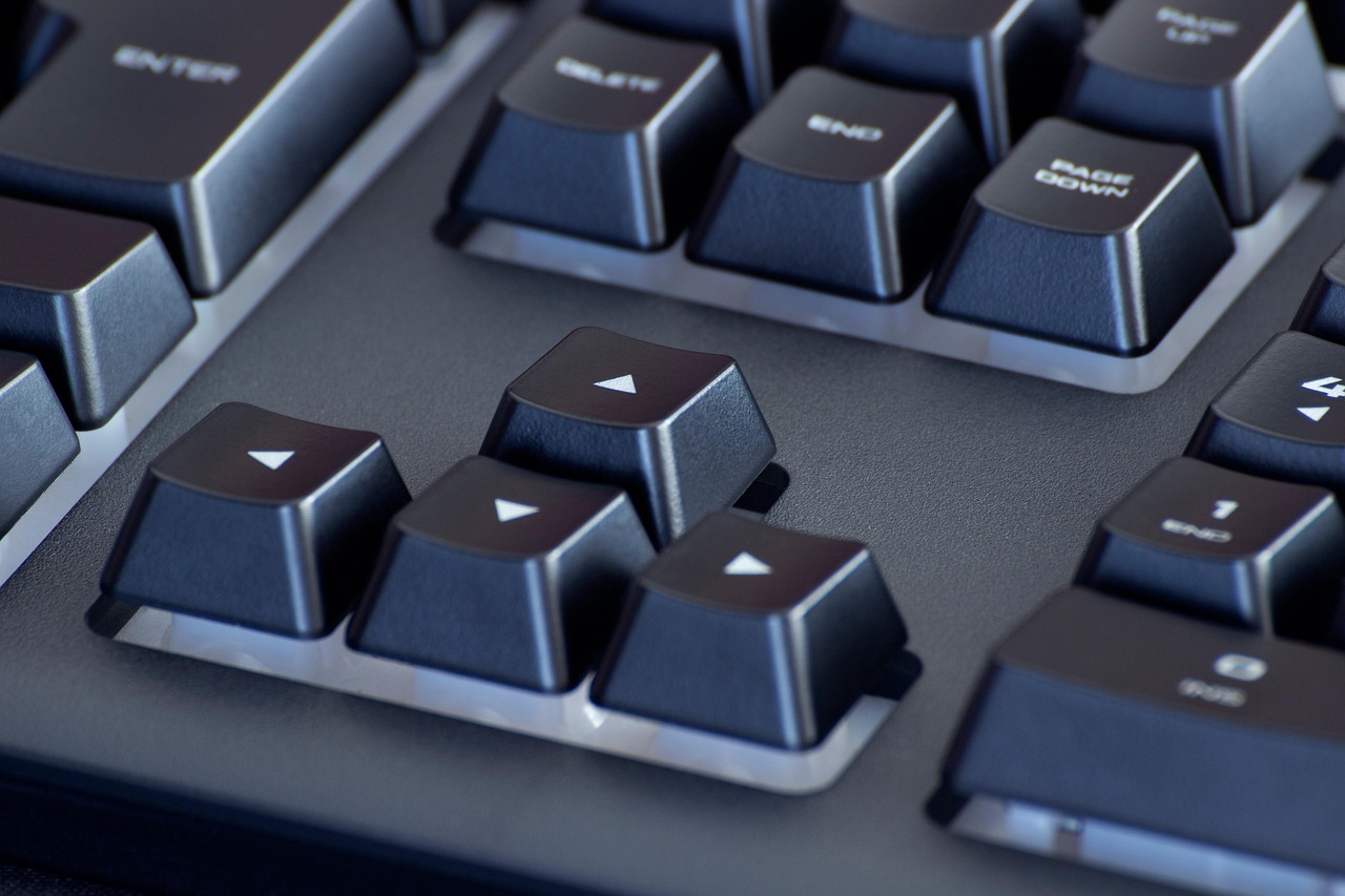 Keys, keyboard, computer — Reasons for Investing in Fiber Optic Internet